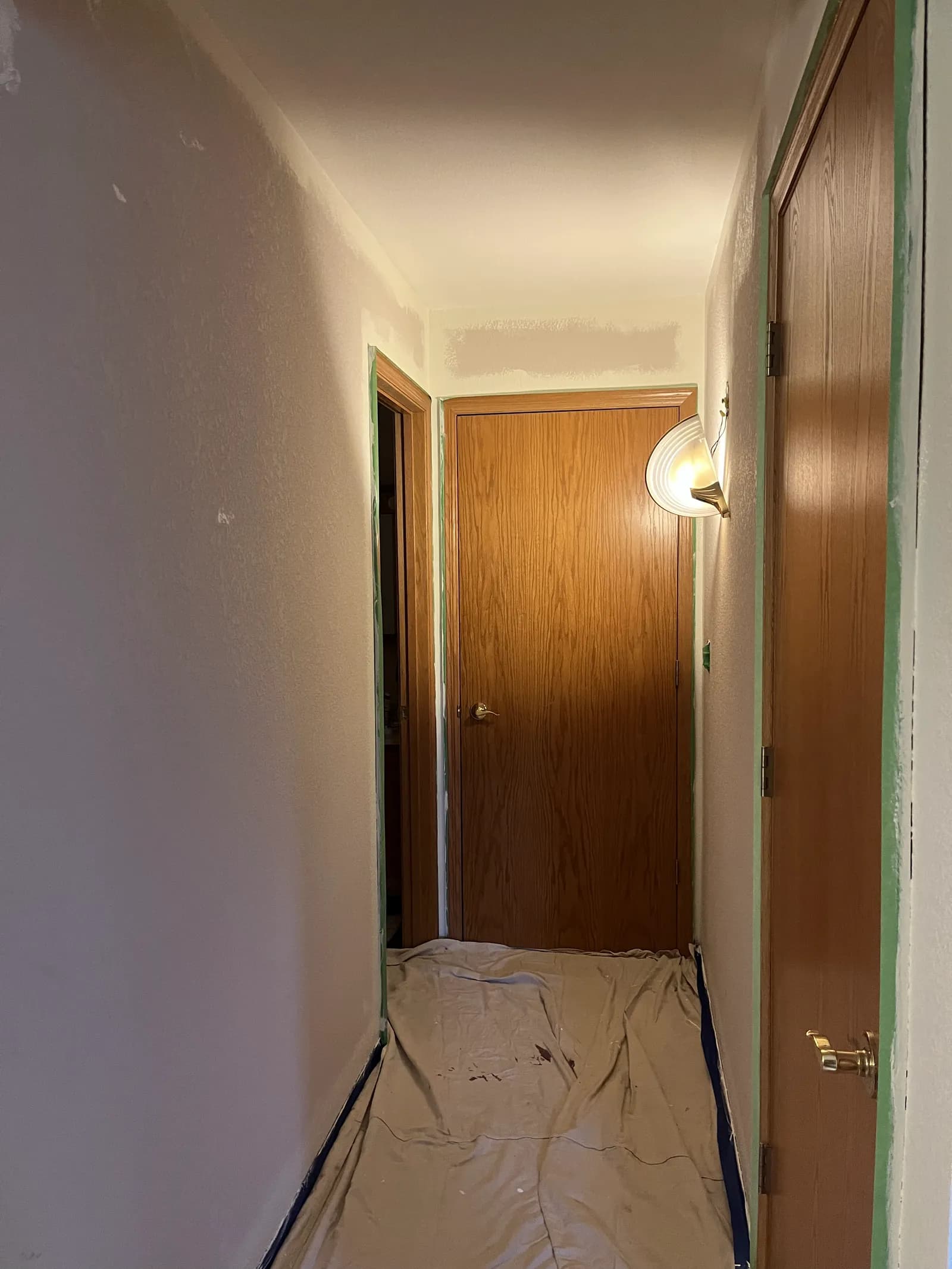 Hallway repaint with trim work by ORC in Iowa City