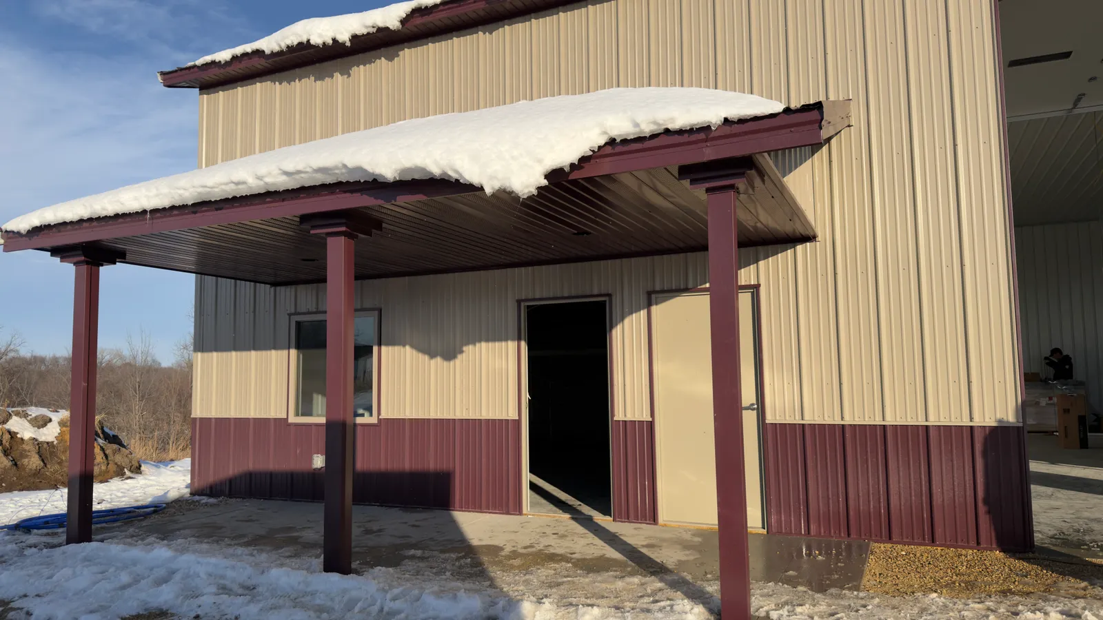 Metal siding and covered porch installed by ORC in Eastern Iowa