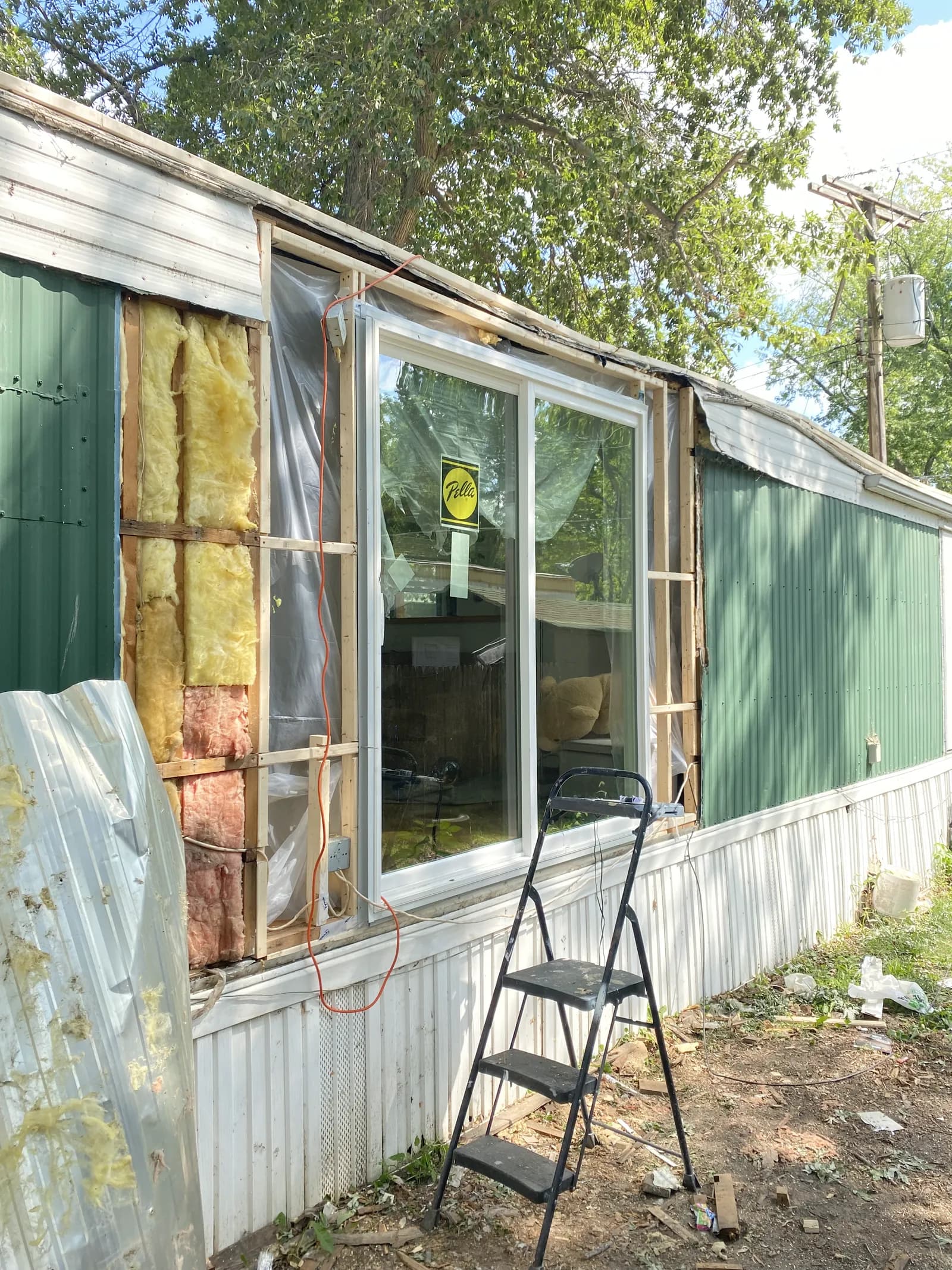 Metal siding and new window after storm repair by ORC in Cedar Rapids