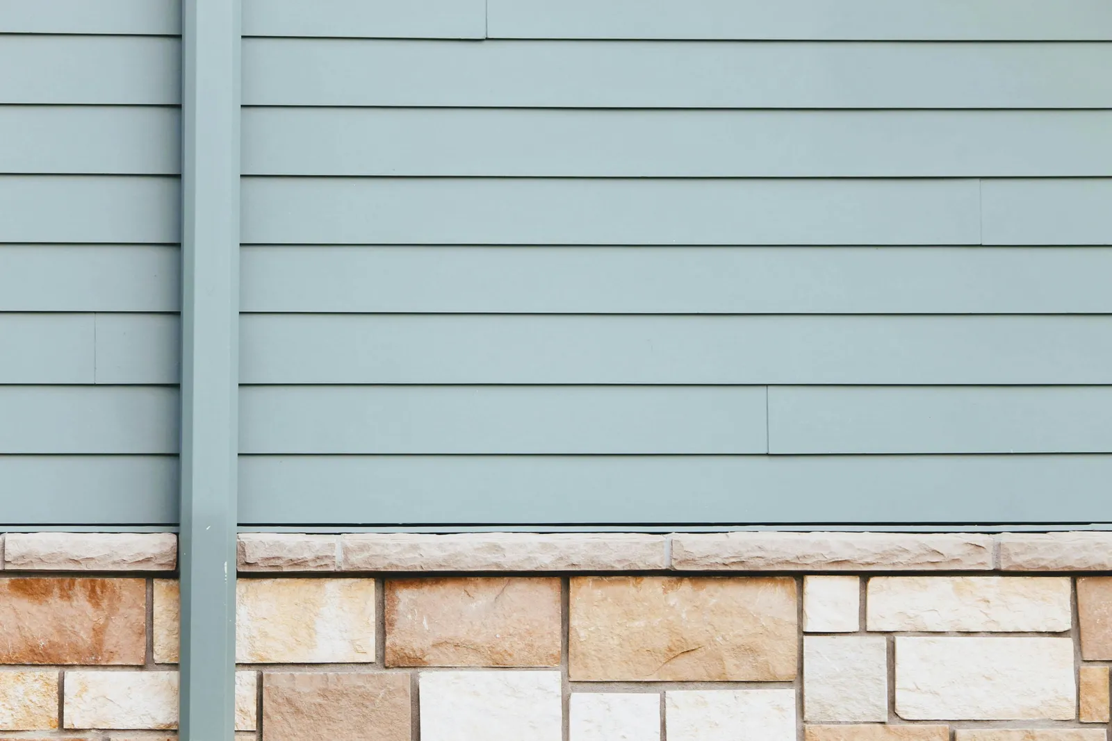 Lap siding and stone exterior installed by ORC in Eastern Iowa